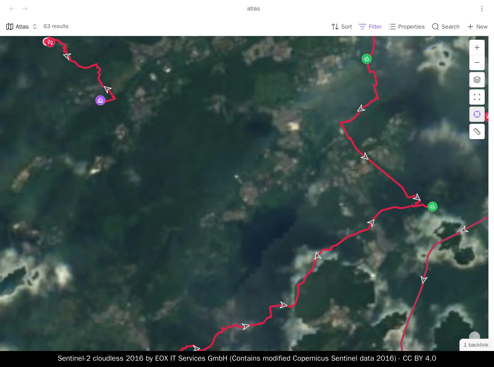 A Base map drawn from a tile pack on disk: satellite imagery read from local files, with two walking routes, their direction arrows, start and end markers and a note’s pin drawn over it